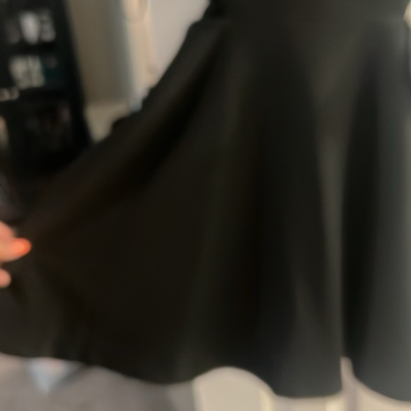 Peplum flair with cutout waist. - Picture 2 of 5